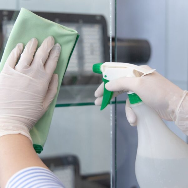 Cleaning with spray bottle and cloth