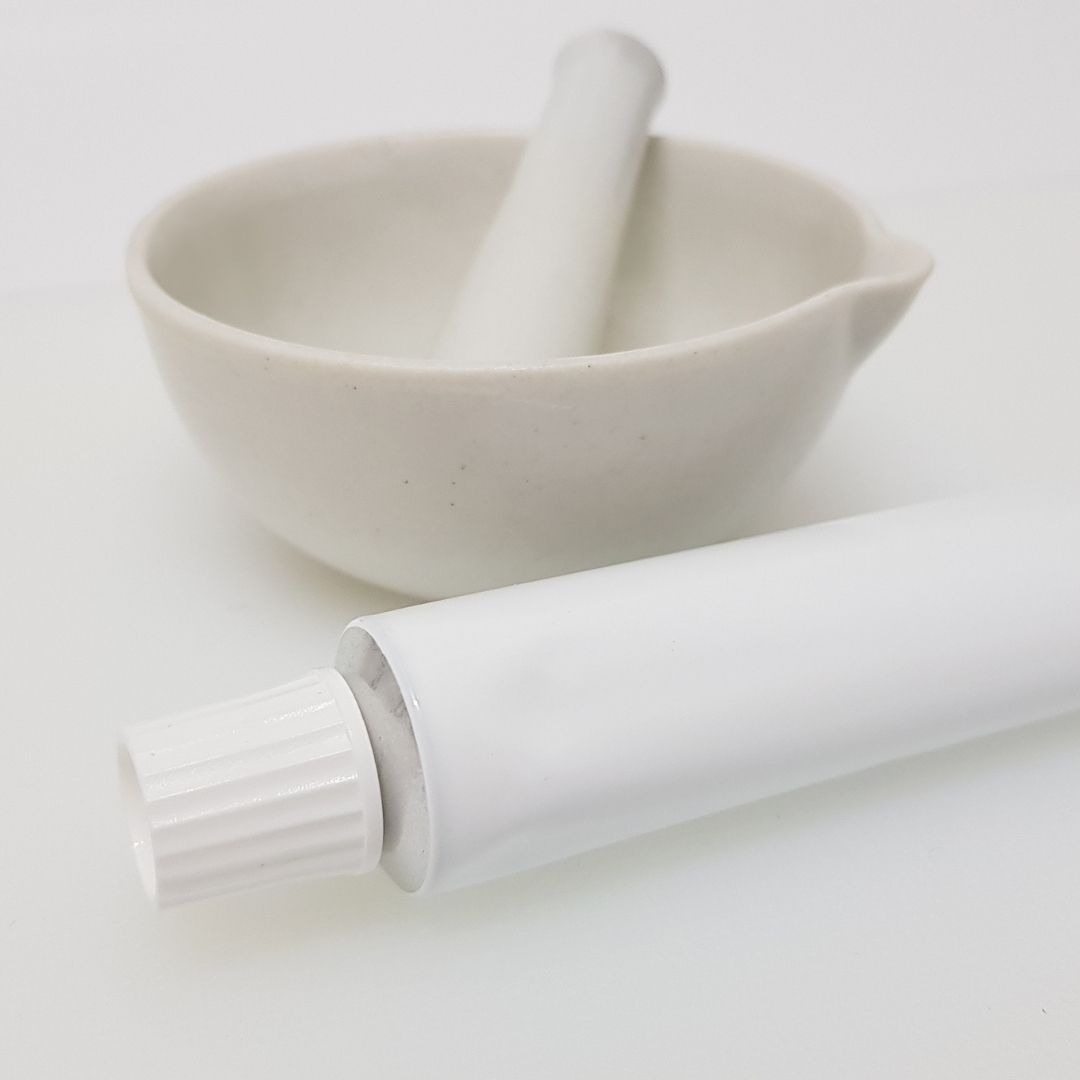 white tube next to bowl
